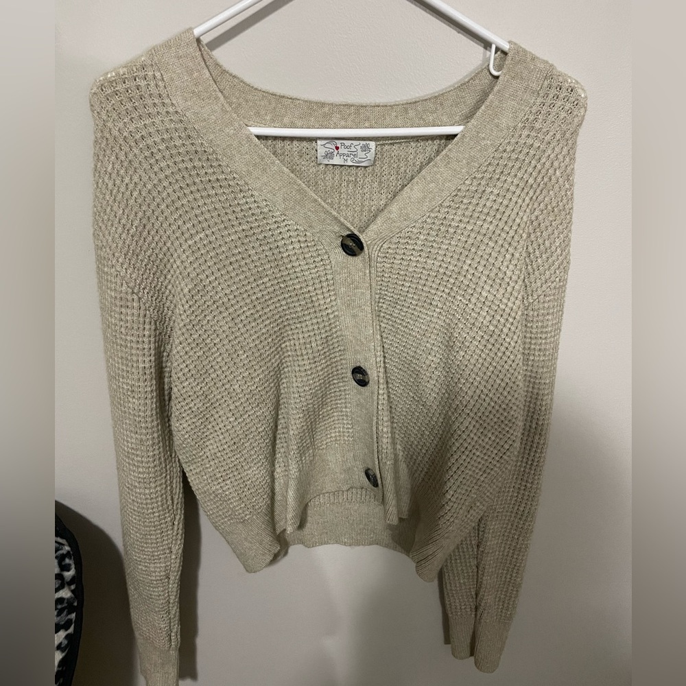 Brand new without tags. V-neck light sweater.